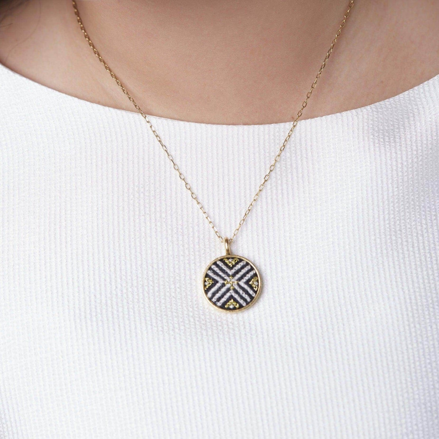 An image of an ethical jewelry necklace showcasing Malaysian heritage, featuring artisanal crafts and cultural preservation.