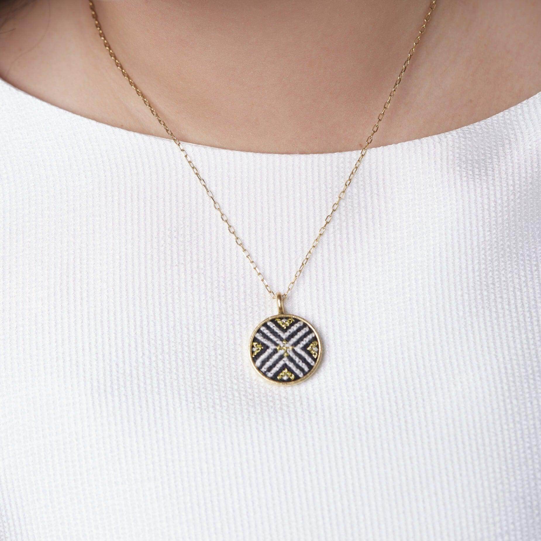 An image of an ethical jewelry necklace showcasing Malaysian heritage, featuring artisanal crafts and cultural preservation.