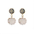 An image of the EarthHeir_ArabesqueBlack_SeashellEarrings_001.jpg by Earth Heir