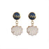 An image of the EarthHeir_NuusumBlue_SeashellEarrings_001.jpg by Earth Heir