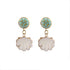 An image of the EarthHeir_Teal_SeashellEarrings_001.jpg by Earth Heir