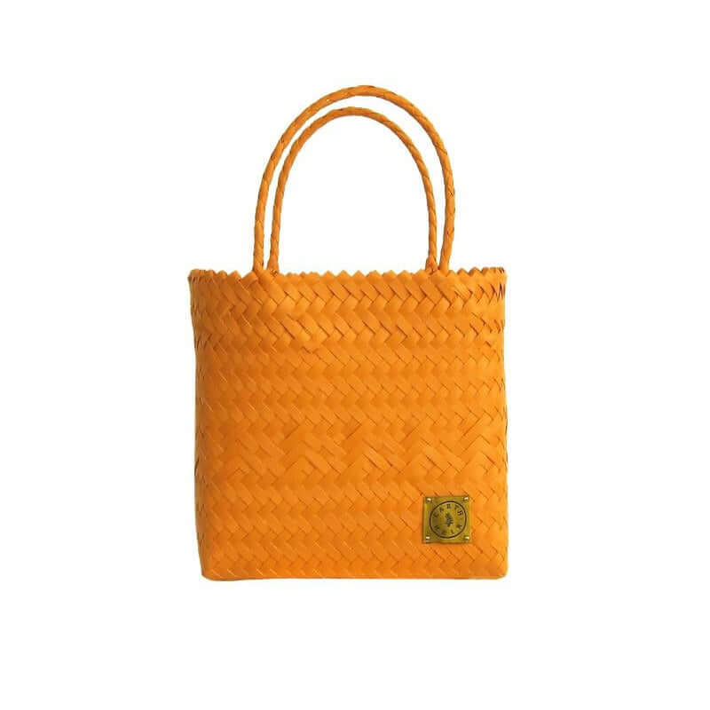 An image of the Mini_Nelly_Tote_Tangerine_97641ddd-d64a-44c1-bec1-b2f3648ff020.jpg by Earth Heir
