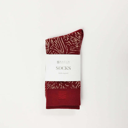 An image of the Socks_MaroonFirework_Whitebox1.jpg by Earth Heir