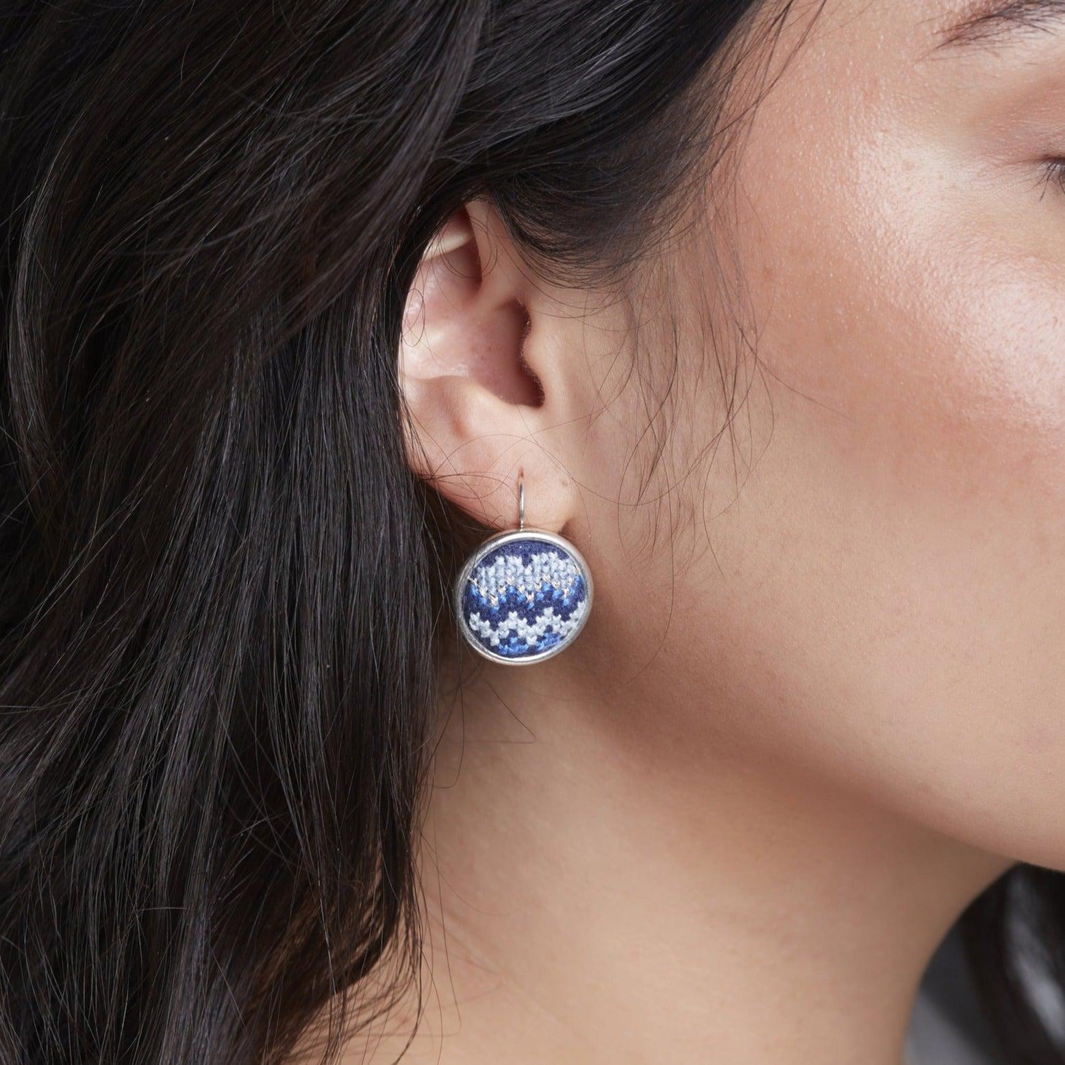 An image of ethical jewelry showcasing handcrafted earrings, reflecting Malaysian heritage and sustainable fashion.