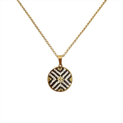 An image of the EarthHeir_ArabesqueBlack_MoonshellNecklace_001.jpg by Earth Heir