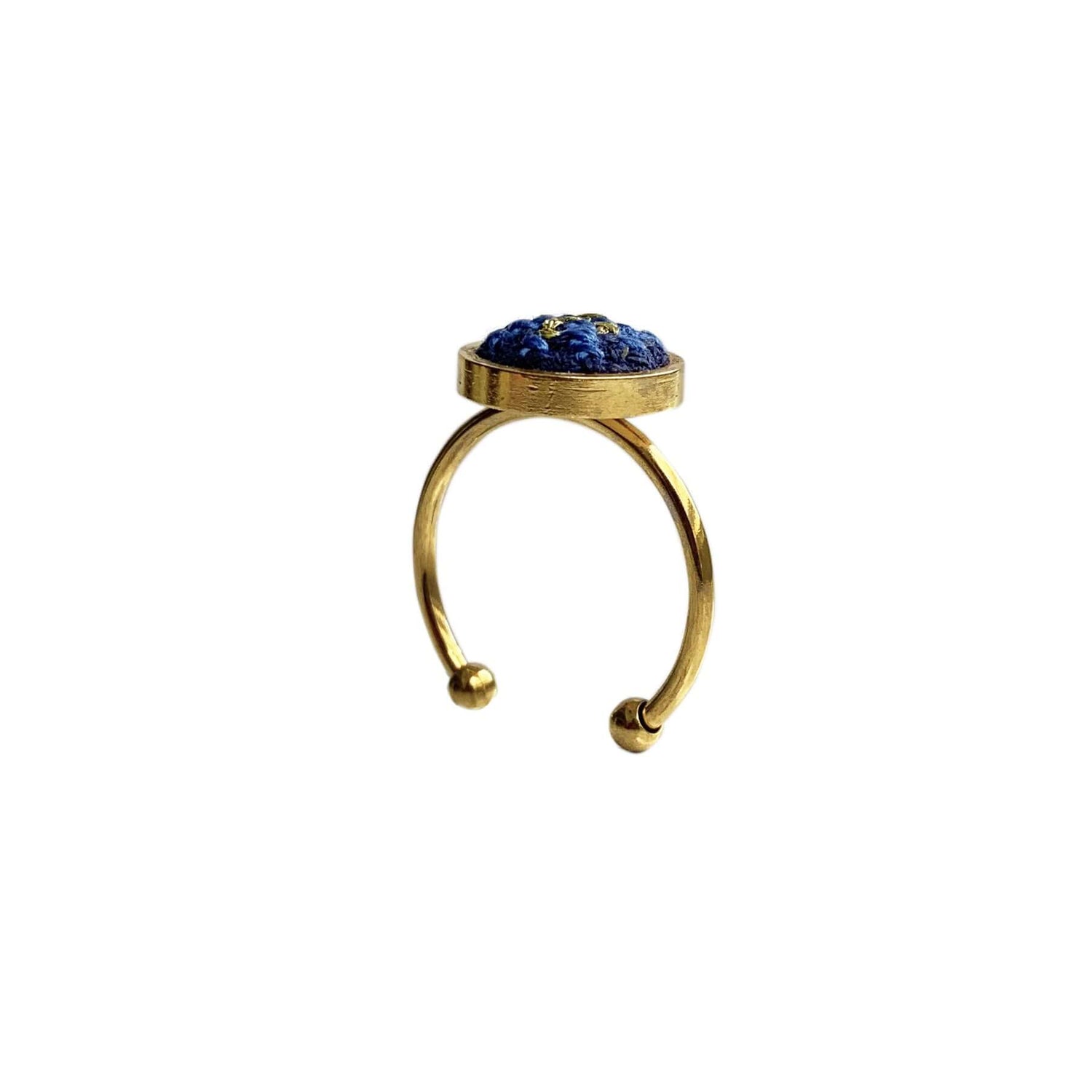 An image of the EarthHeir_ArabesqueBlue_DolphinRing_001.jpg by Earth Heir