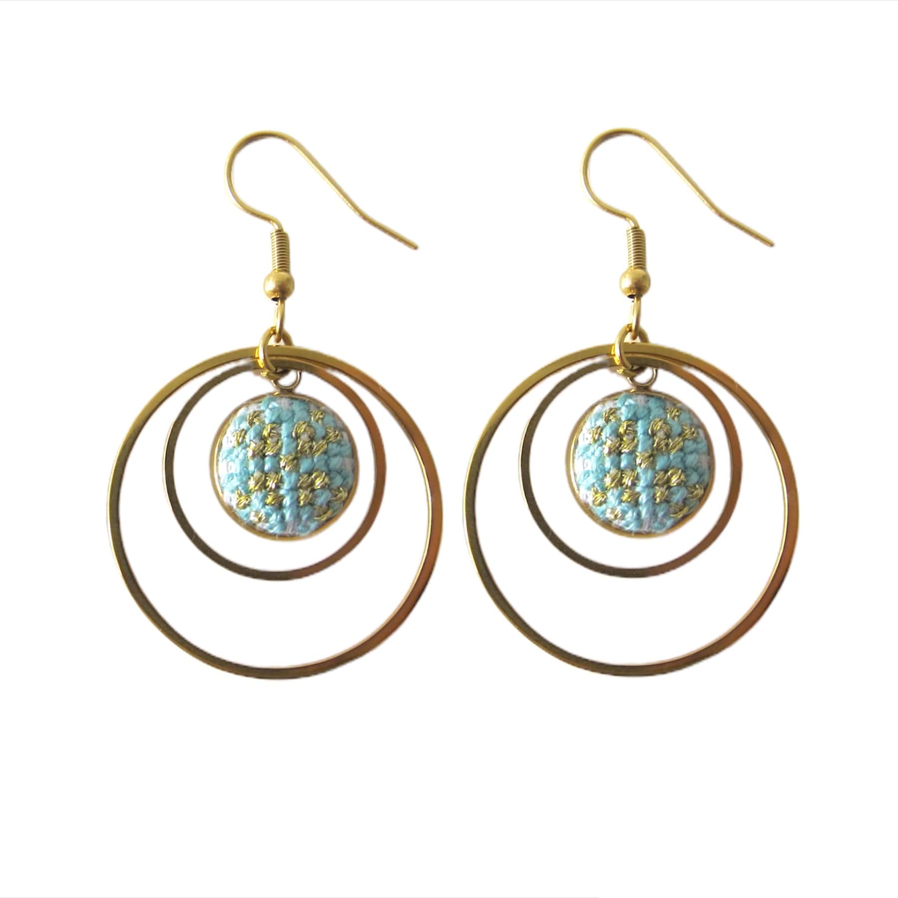 An image of the EarthHeir_Teal_CrownEarrings_001.jpg by Earth Heir