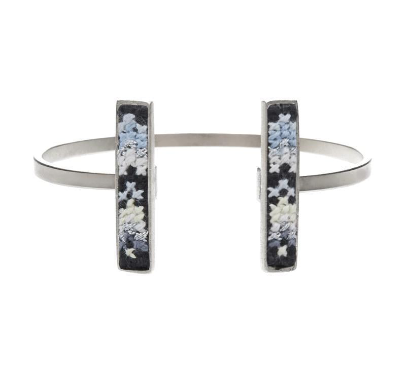 An image of the GLOW_CUFF_SILVER_BLACK_NUUSUM.jpg by Earth Heir