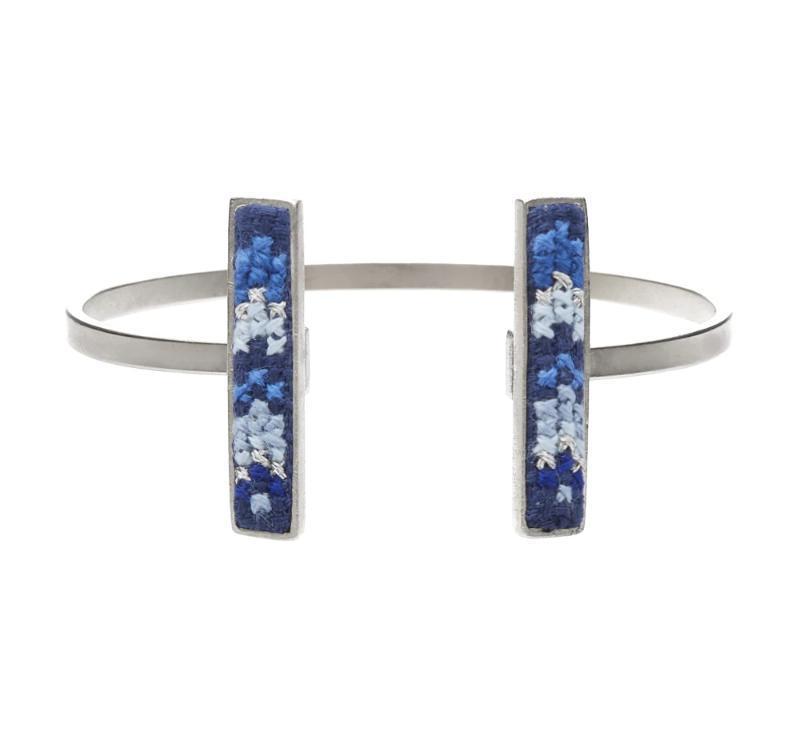 An image of the GLOW_CUFF_SILVER_BLUE_NUUSUM_0e584da4-a20b-4f5a-9b3f-cccd2c142b96.jpg by Earth Heir