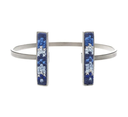An image of the GLOW_CUFF_SILVER_BLUE_NUUSUM_0e584da4-a20b-4f5a-9b3f-cccd2c142b96.jpg by Earth Heir