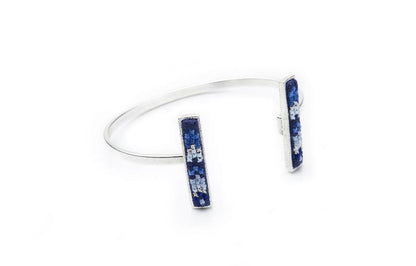 An image of the GLOW_CUFF_SILVER_BLUE_NUUSUM_2_e81d5e9e-8442-4146-b735-c28f3e017fa8.jpg by Earth Heir