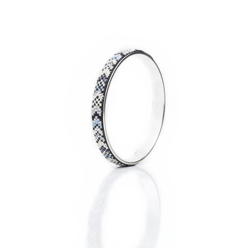An image of the GLOW_SLIM_SILVER_BLACK_NUUSUM_2.jpg by Earth Heir
